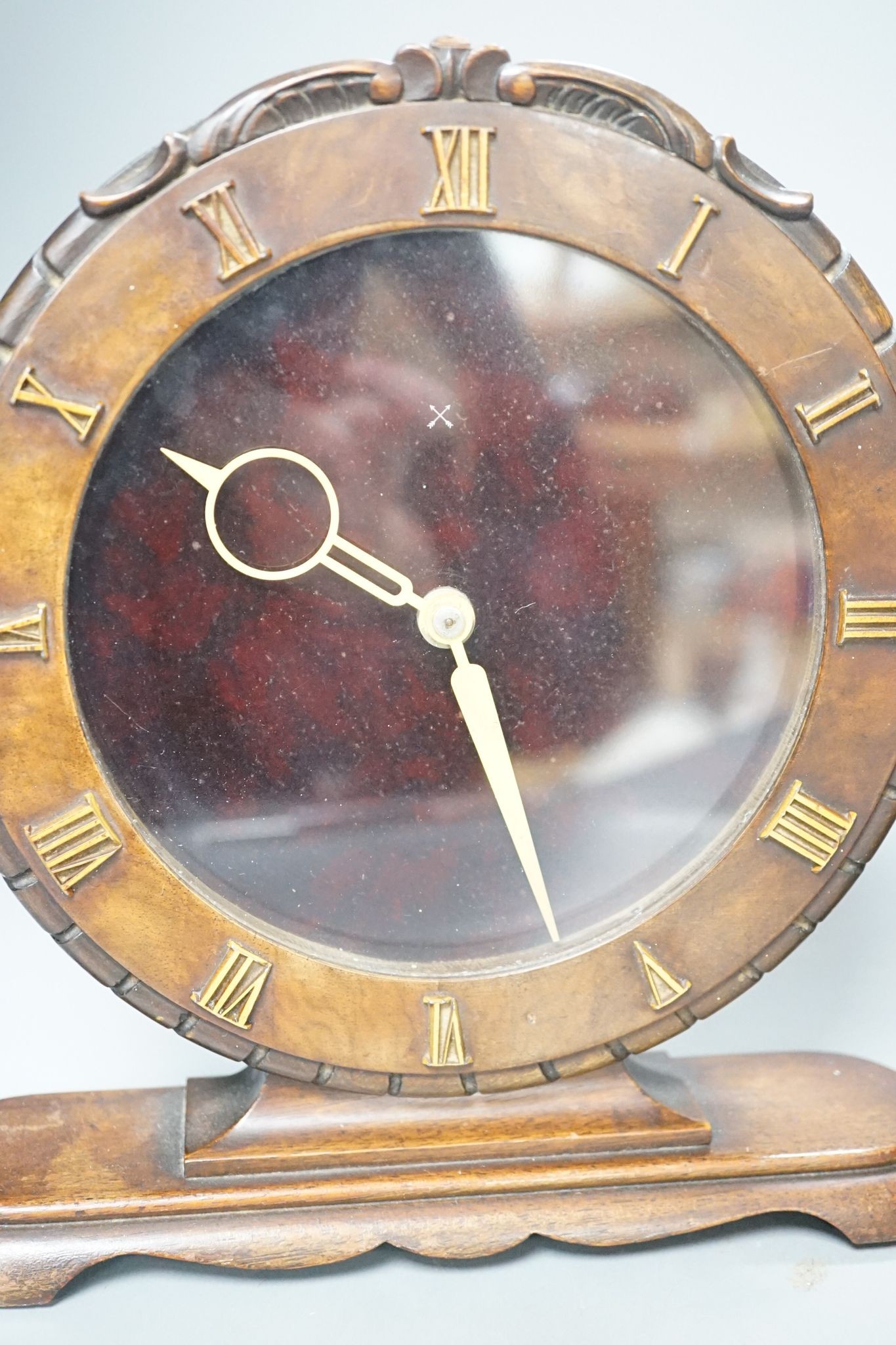 A Victorian walnut clock and an Art Deco walnut clock